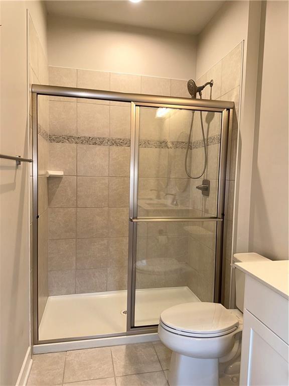 4408 Spruce Road Gibsonia, PA 15044 - Photo 25 of 40 a bathroom with a shower and a toilet