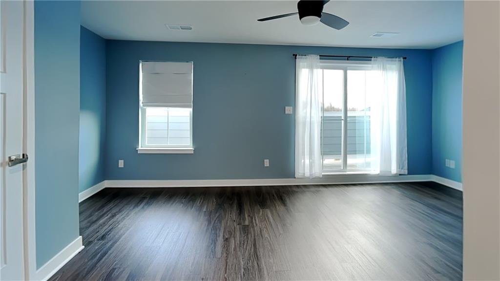 4408 Spruce Road Gibsonia, PA 15044 - Photo 29 of 40 an empty room with wooden floor and windows