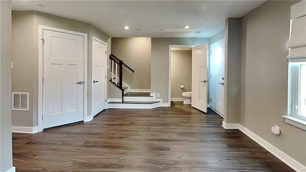 4408 Spruce Road Gibsonia, PA 15044 - Photo 6 of 40 a view of an entryway with wooden floor and staircase