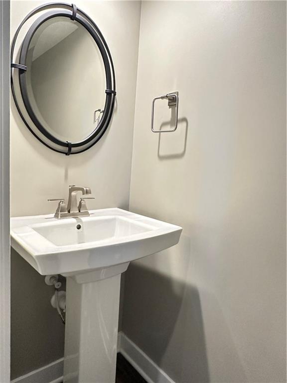 4408 Spruce Road Gibsonia, PA 15044 - Photo 7 of 40 a bathroom with a sink and mirror