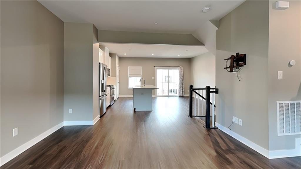 4408 Spruce Road Gibsonia, PA 15044 - Photo 10 of 40 wooden floor in a hall with a window