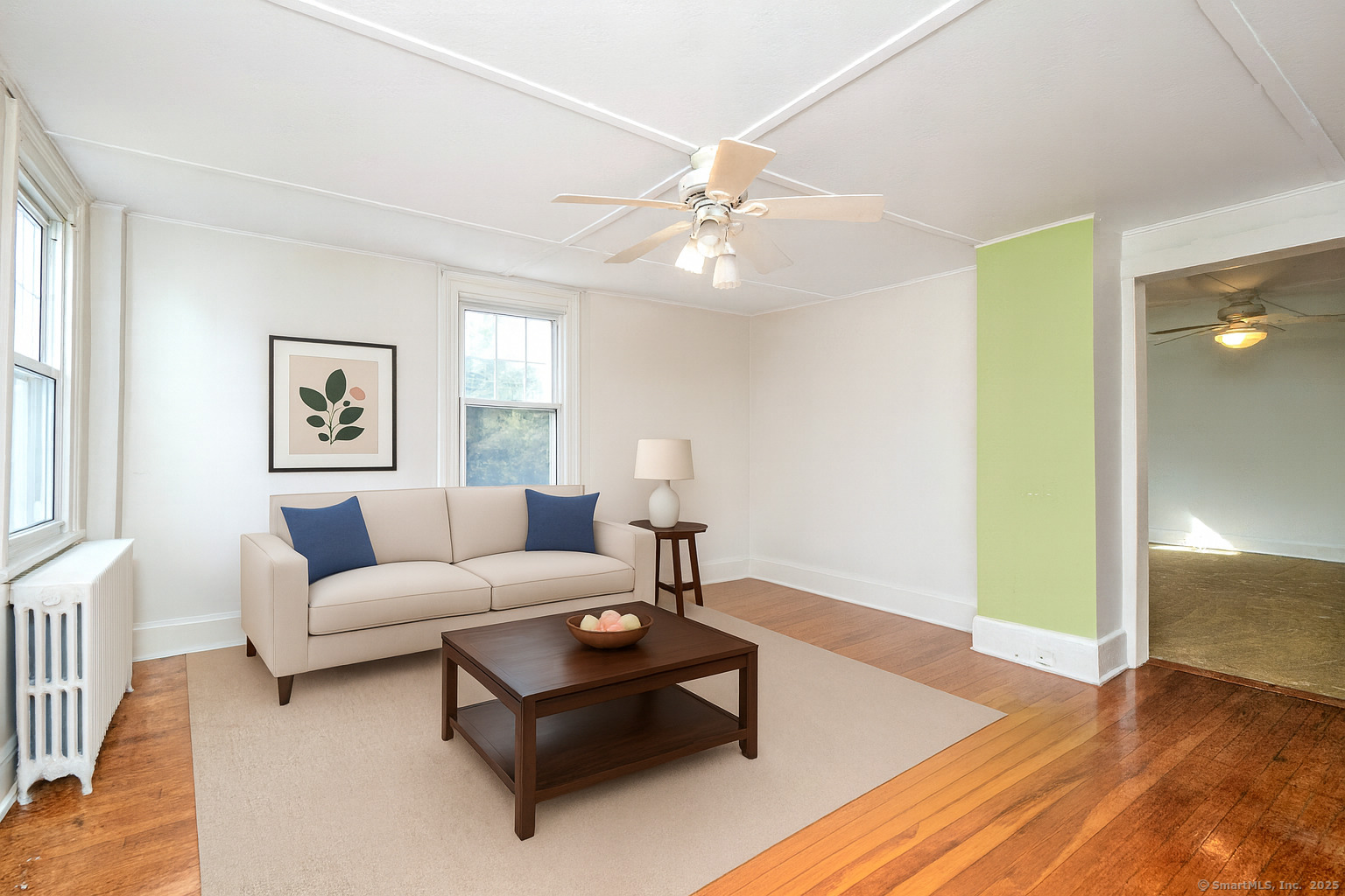 35 Ramapoo Road Ridgefield, CT 06877 - Photo 13 of 38 a living room with furniture and a chandelier
