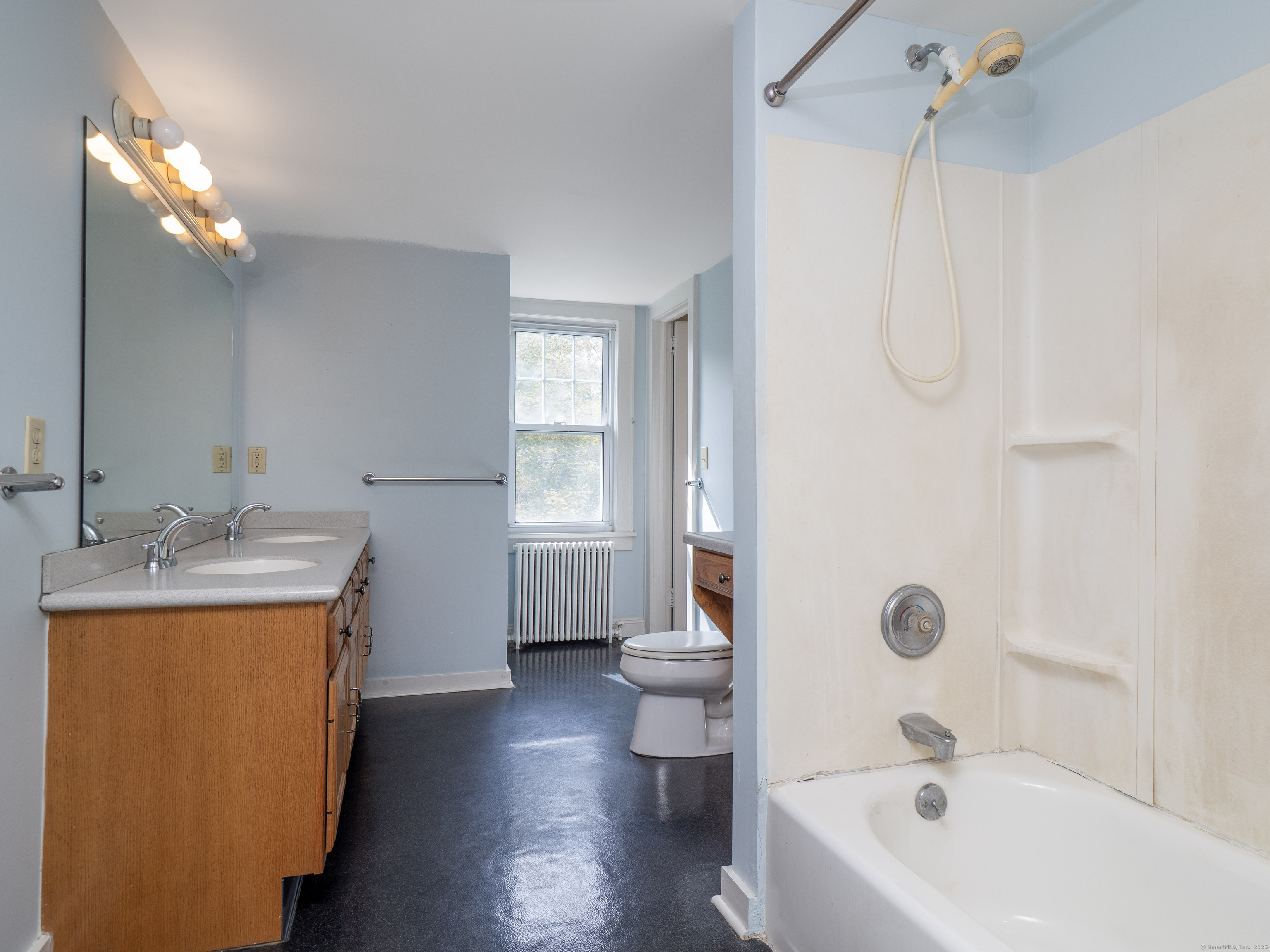 35 Ramapoo Road Ridgefield, CT 06877 - Photo 18 of 38 a bathroom with a sink a toilet and shower