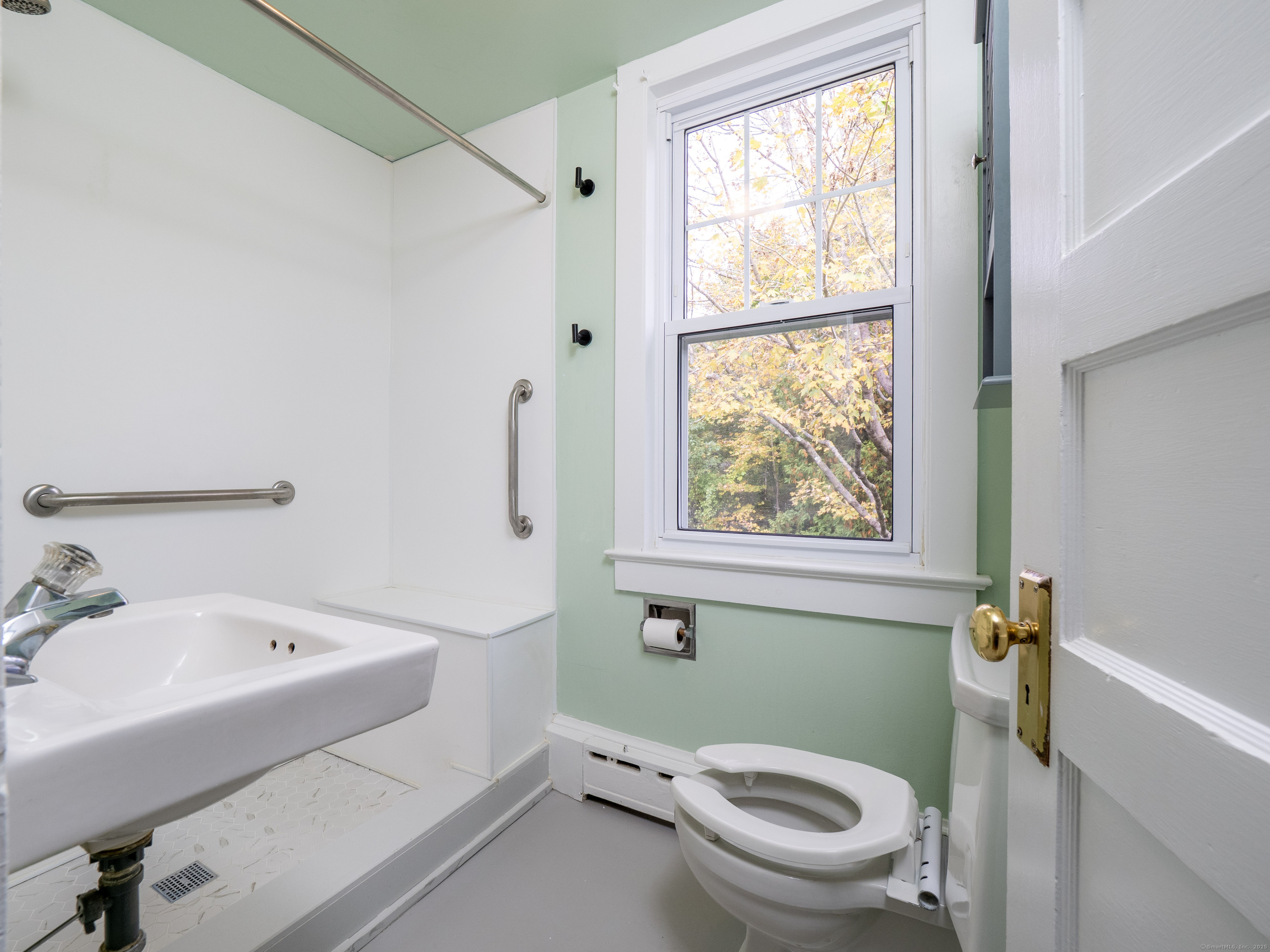 35 Ramapoo Road Ridgefield, CT 06877 - Photo 30 of 38 a bathroom with a sink a toilet and a bathtub