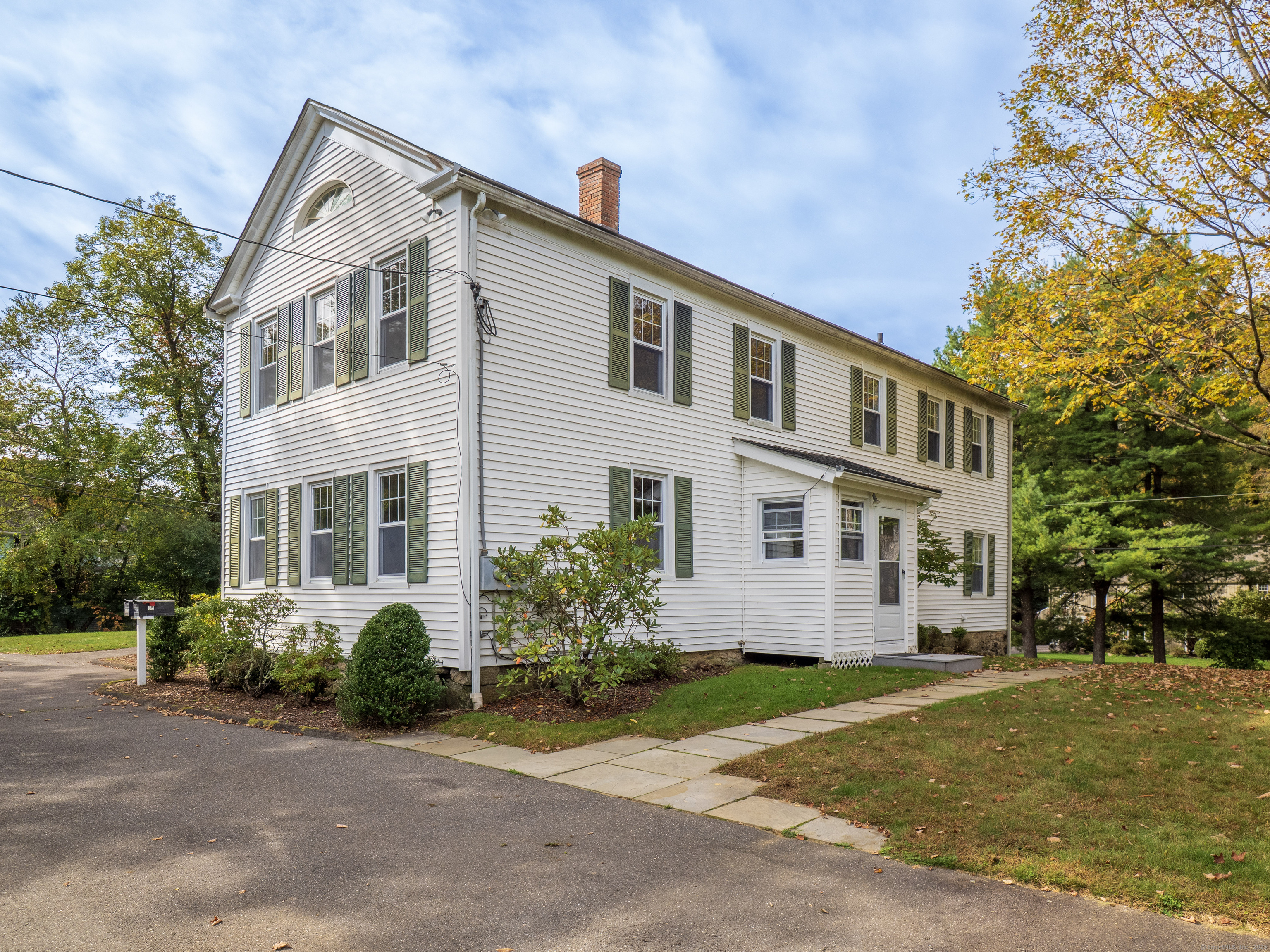 35 Ramapoo Road Ridgefield, CT 06877 - Photo 5 of 38 a front view of house with yard