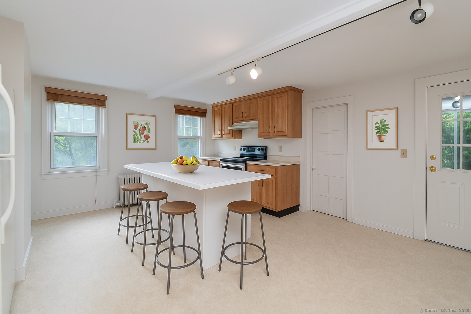35 Ramapoo Road Ridgefield, CT 06877 - Photo 10 of 38 a kitchen with a sink cabinets and window