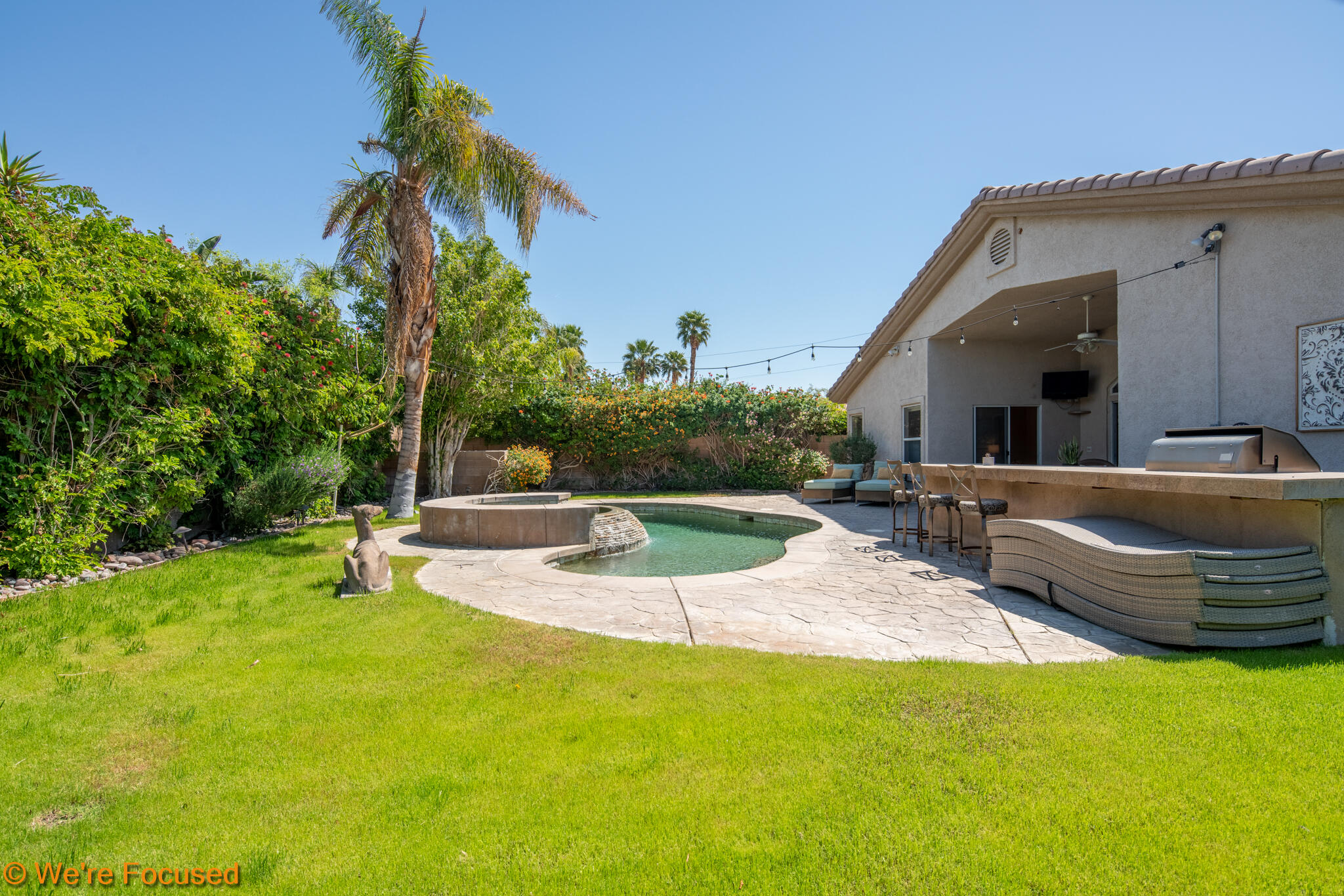 74068 College View Circle West Palm Desert, CA 92211 - Photo 1 of 34 a view of a backyard with a patio and plants