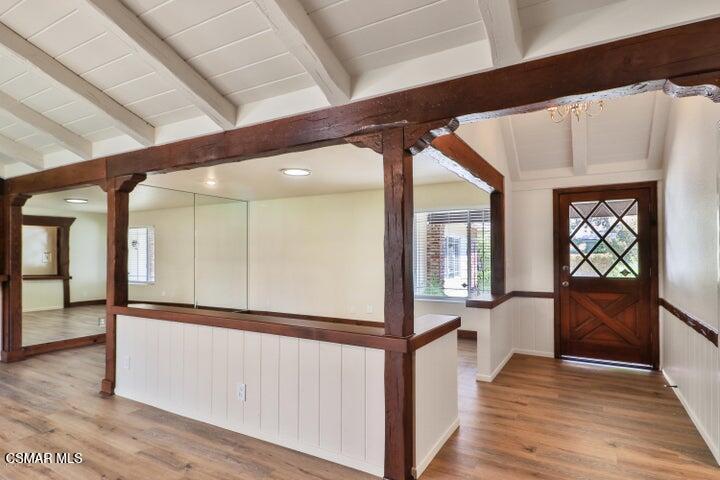 2379 Welcome Court Simi Valley, CA 93063 - Photo 17 of 49 a view of a hallway with wooden floor and staircase