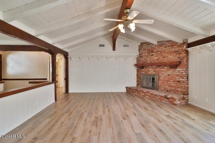 2379 Welcome Court Simi Valley, CA 93063 - Photo 23 of 49 wooden floor in an empty room with a fireplace