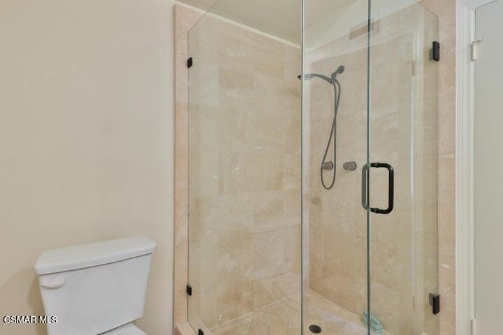 2379 Welcome Court Simi Valley, CA 93063 - Photo 34 of 49 a bathroom with a shower and toilet