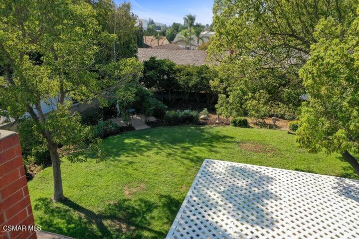 2379 Welcome Court Simi Valley, CA 93063 - Photo 44 of 49 a view of a garden with a building