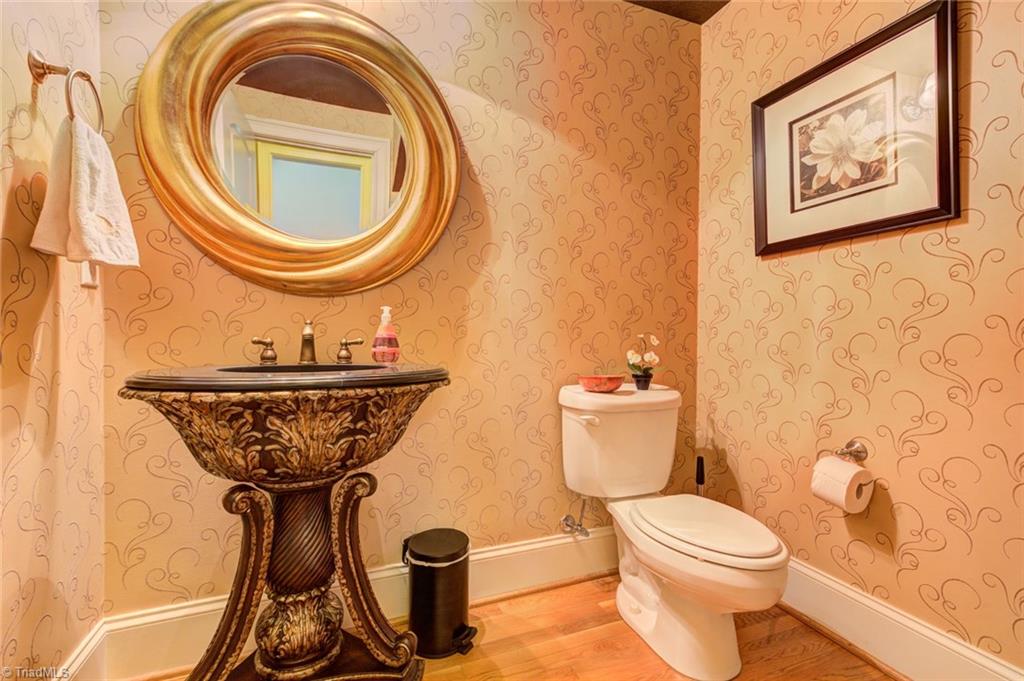 5909 Ballinger Road, Unit D Greensboro, NC 27410 - Photo 14 of 30 Main level guest half bath.