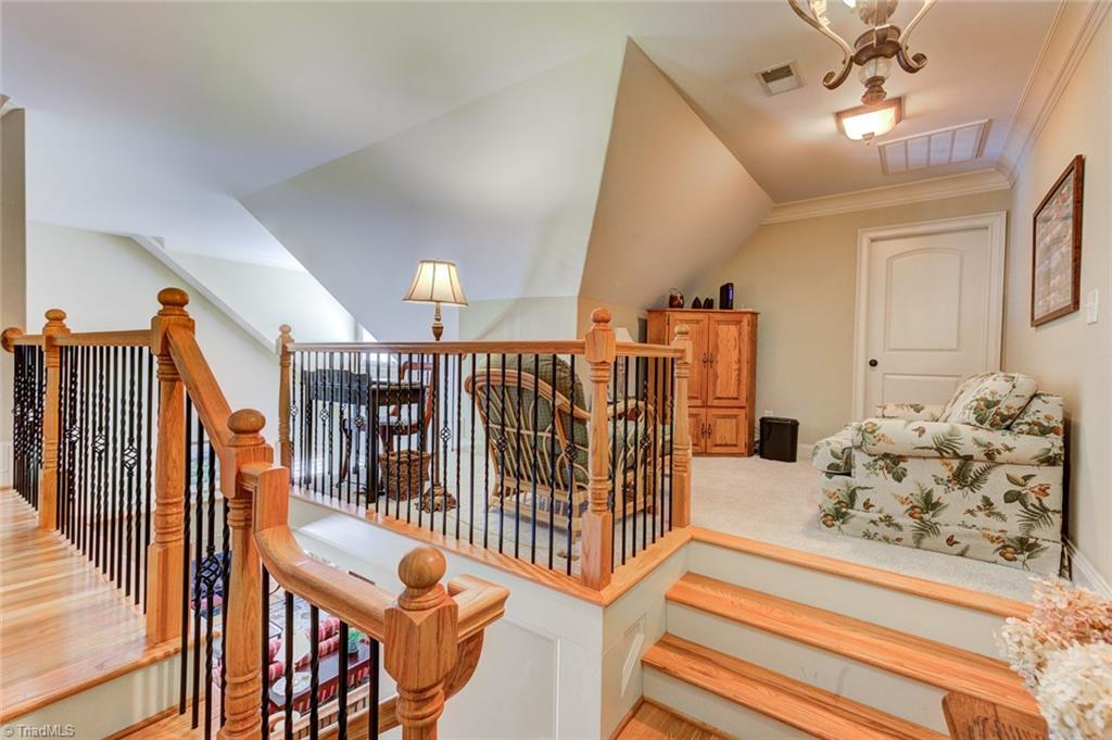 5909 Ballinger Road, Unit D Greensboro, NC 27410 - Photo 21 of 30 The open loft area is a wonderful place to relax.