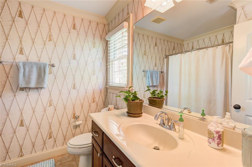 5909 Ballinger Road, Unit D Greensboro, NC 27410 - Photo 24 of 30 Second bedroom's private bathroom