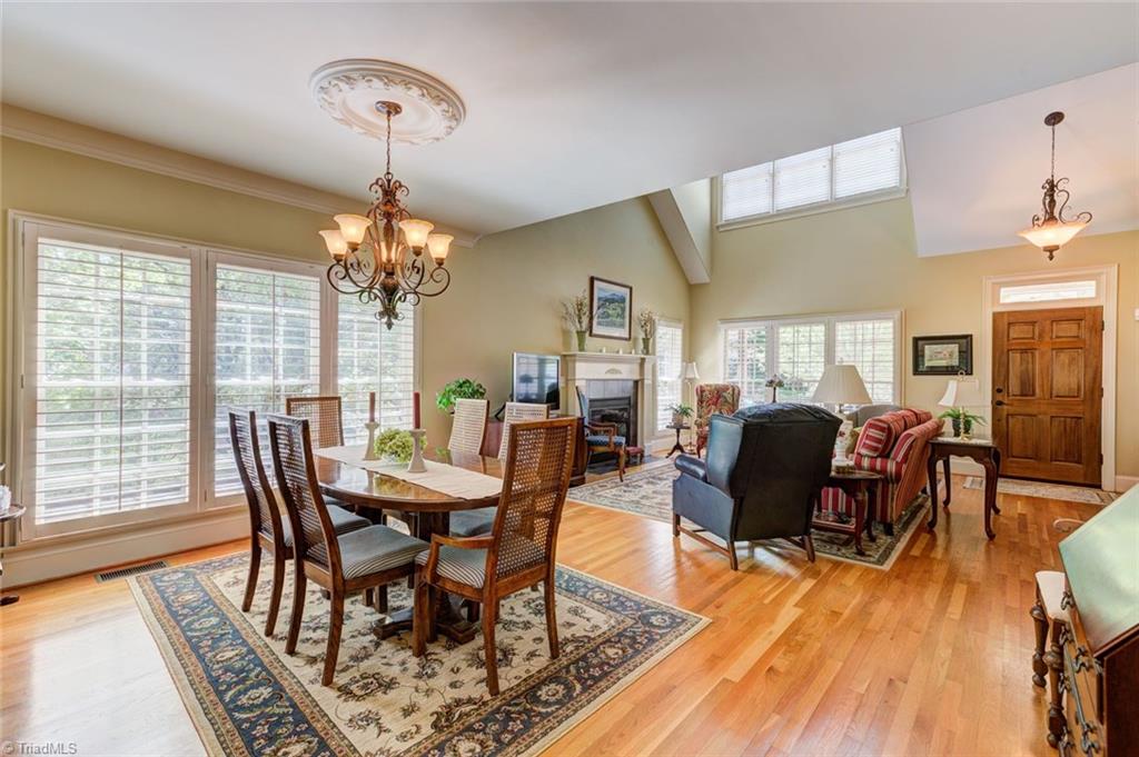 5909 Ballinger Road, Unit D Greensboro, NC 27410 - Photo 9 of 30 Modern, open layout. Beautiful hardwood floors.