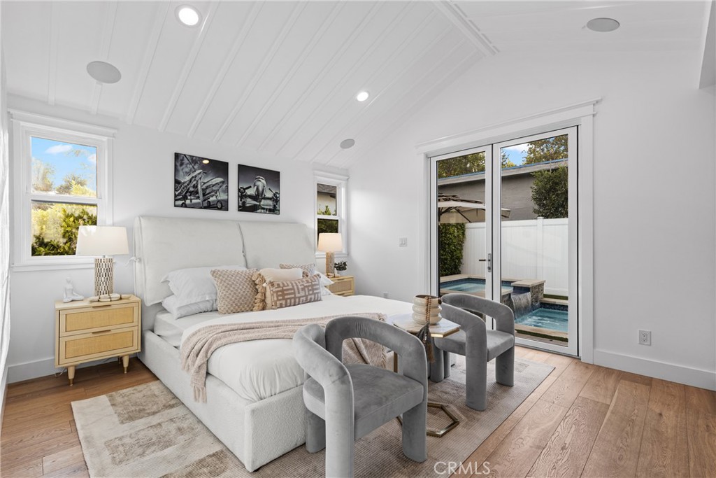 12947 La Maida Street Sherman Oaks, CA 91423 - Photo 16 of 31 a bedroom with a bed and a table