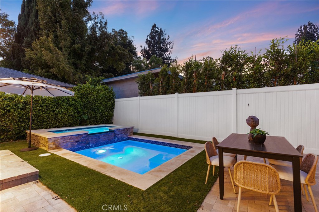 12947 La Maida Street Sherman Oaks, CA 91423 - Photo 29 of 31 a view of swimming pool with seating space and yard in the back