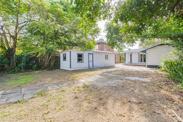 a house with trees in front of it