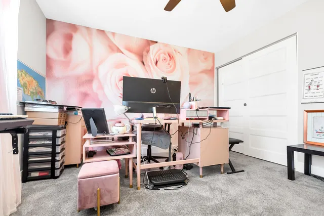 a view of a workspace with furniture