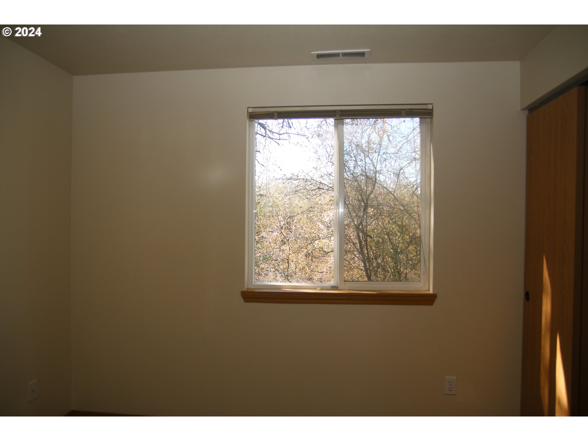 452 Olson Drive Jefferson, OR 97352 - Photo 13 of 17 a view of an empty room with a window