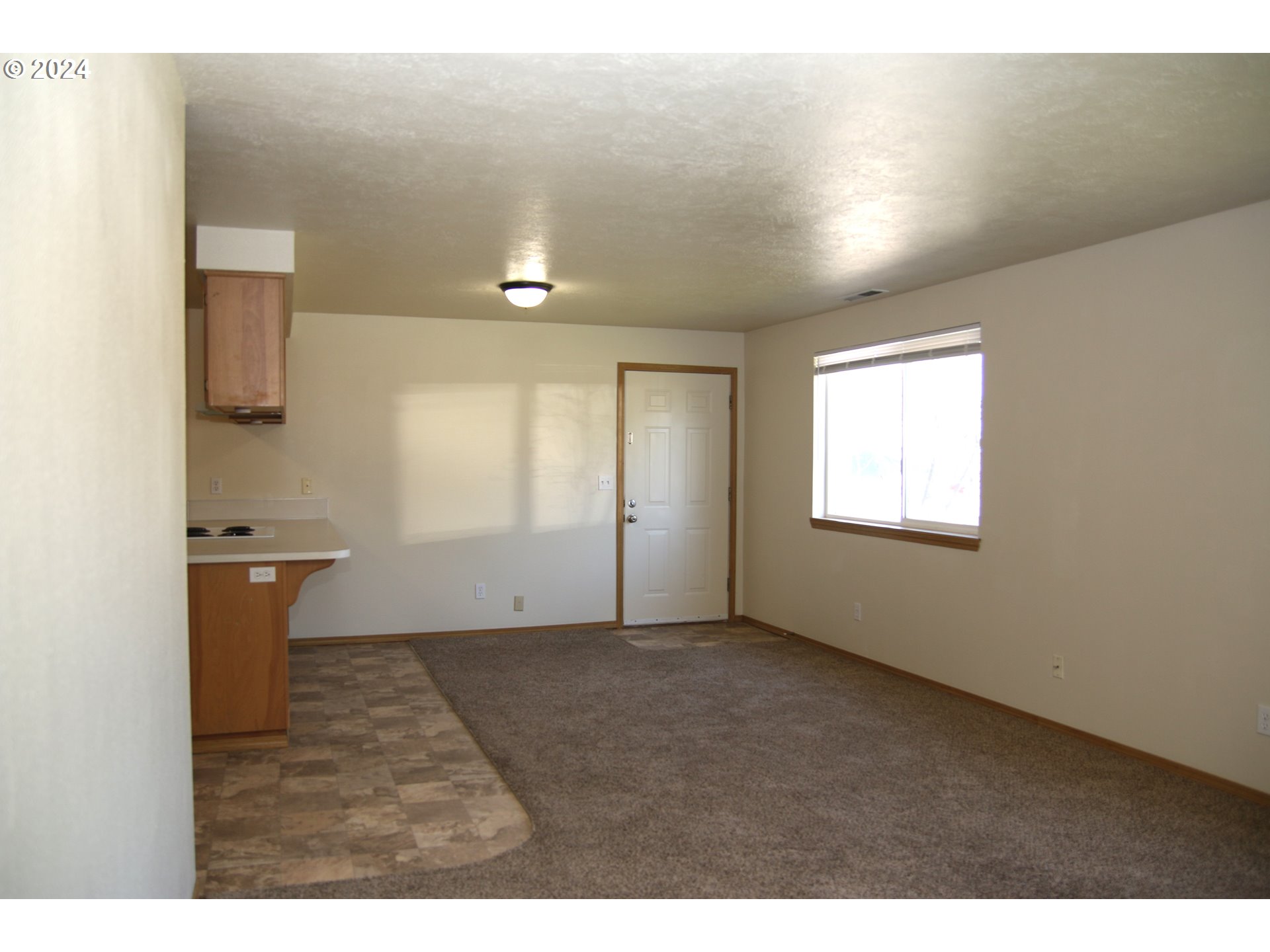 452 Olson Drive Jefferson, OR 97352 - Photo 3 of 17 a view of an empty room with a window