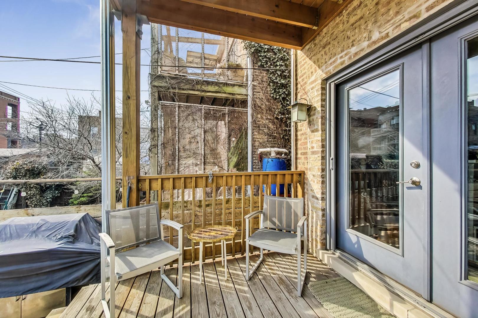 2445 West Rice Street Chicago, IL 60622 - Photo 34 of 46 a view of balcony with a patio