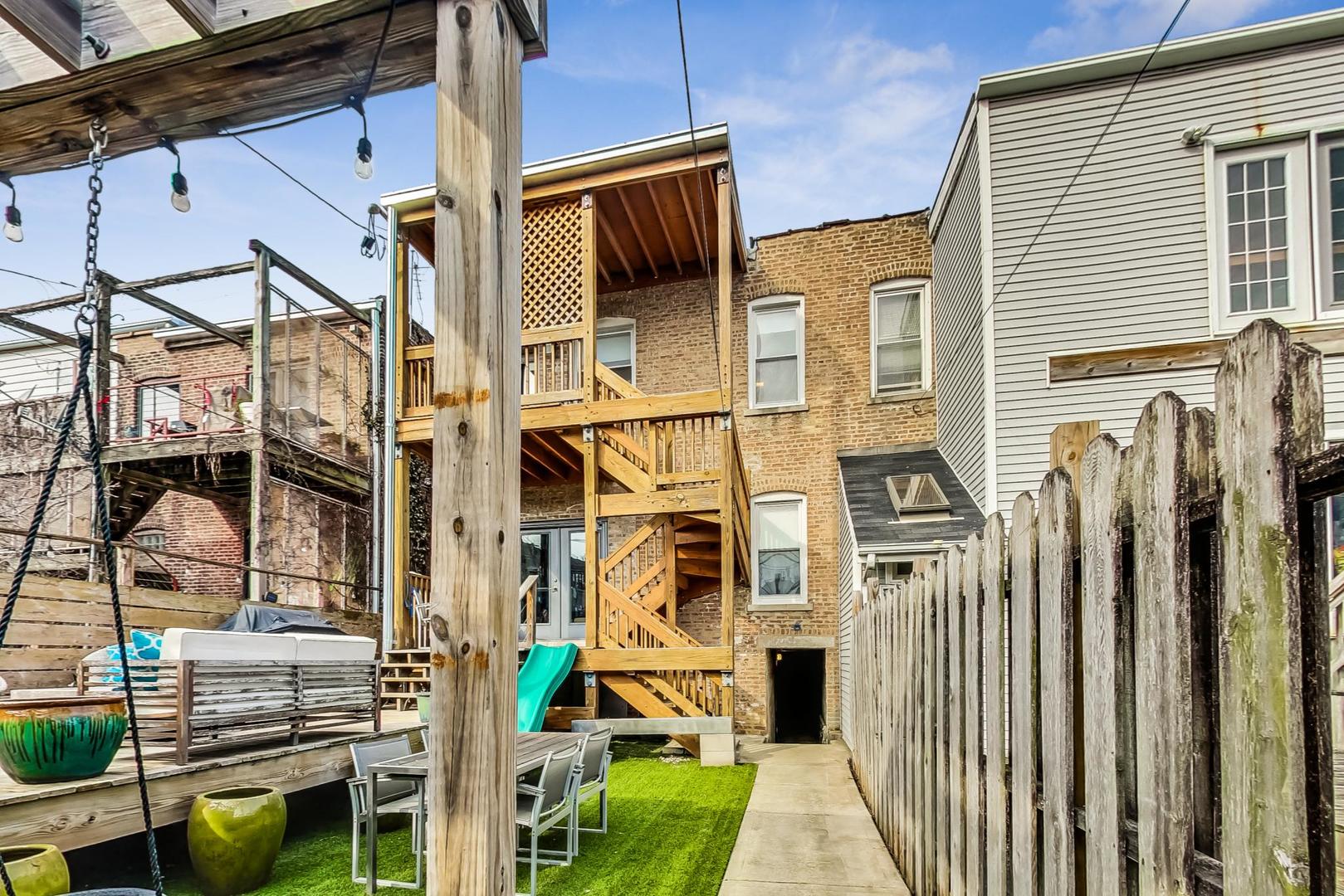 2445 West Rice Street Chicago, IL 60622 - Photo 38 of 46 a view of a house with a street