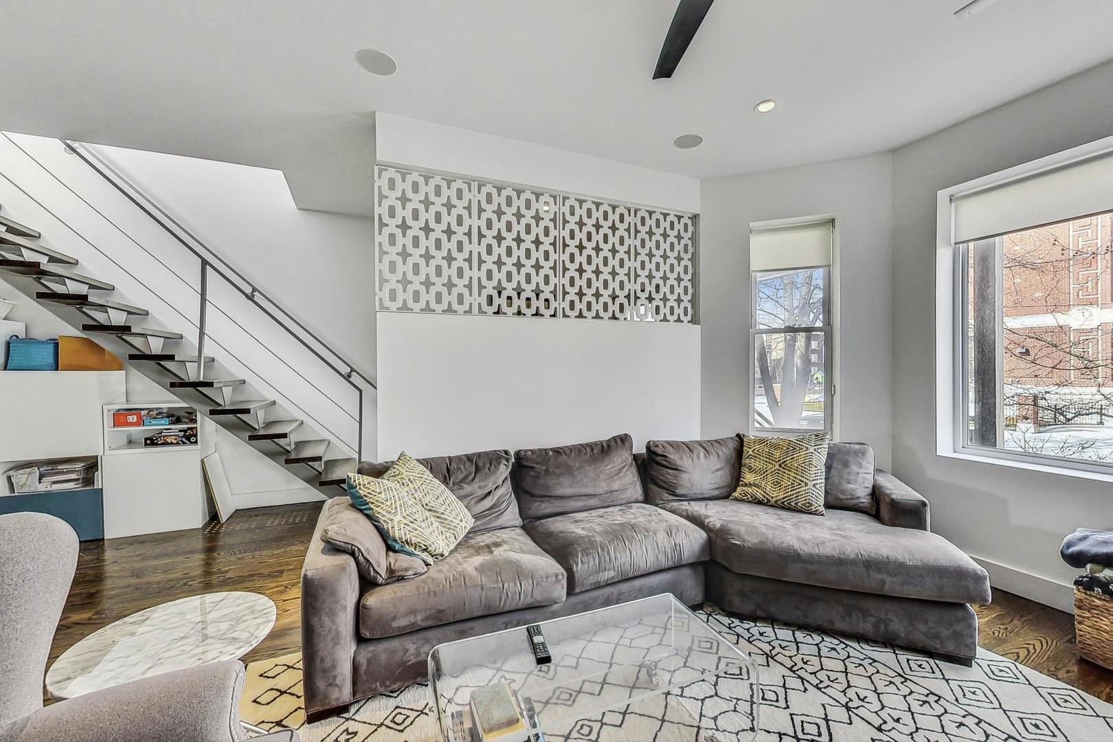 2445 West Rice Street Chicago, IL 60622 - Photo 5 of 46 a living room with furniture and a window