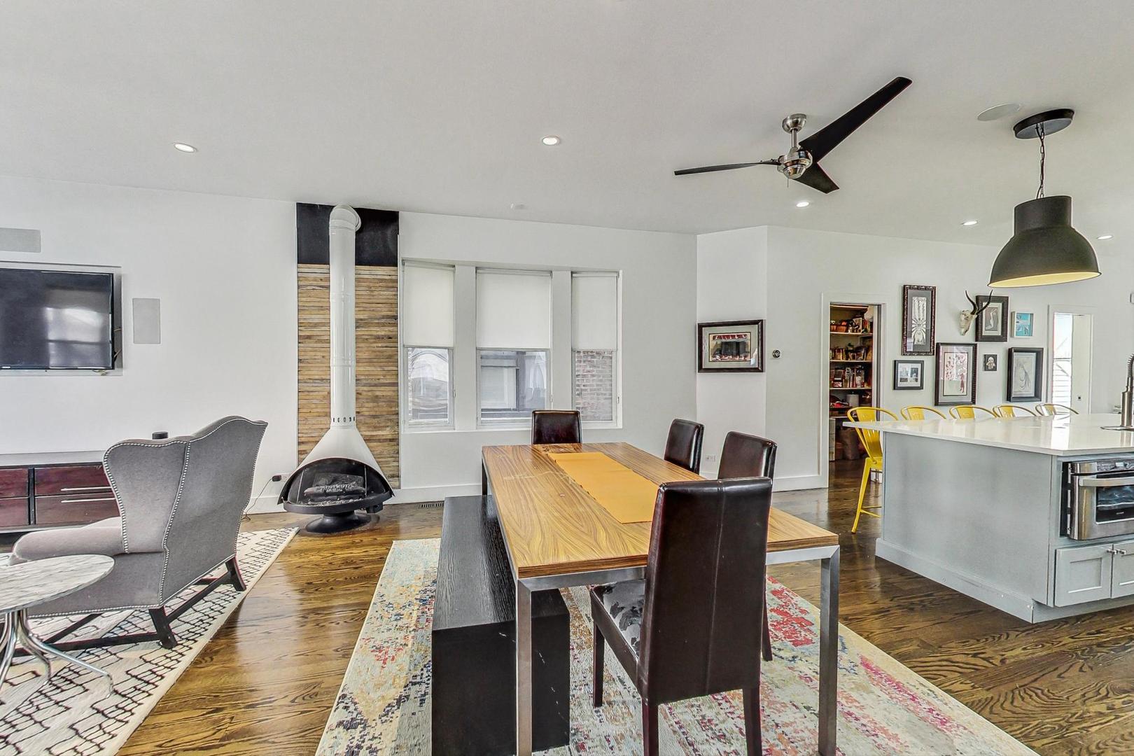 2445 West Rice Street Chicago, IL 60622 - Photo 9 of 46 a living room with furniture and a window