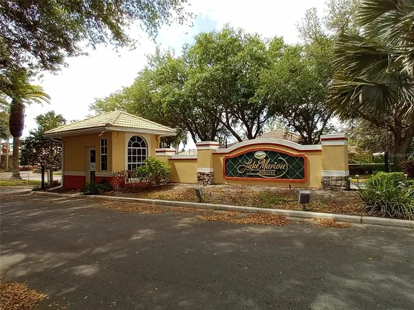 a view of outdoor space with garden and trees