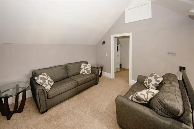 a living room with furniture and a couch