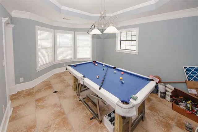 a room with gym equipment and a large window