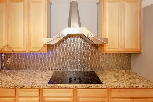 a kitchen with a sink and a window