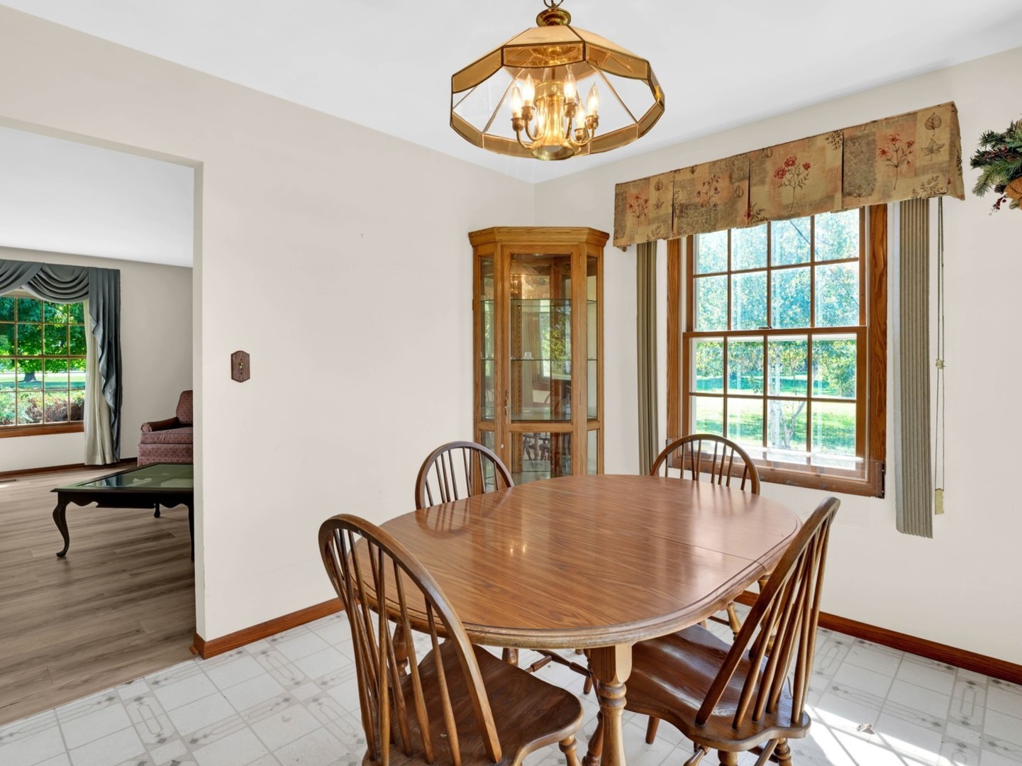 3303 Vermont Road Woodstock, IL 60098 - Photo 13 of 68 a view of a dining room with furniture window and outside view
