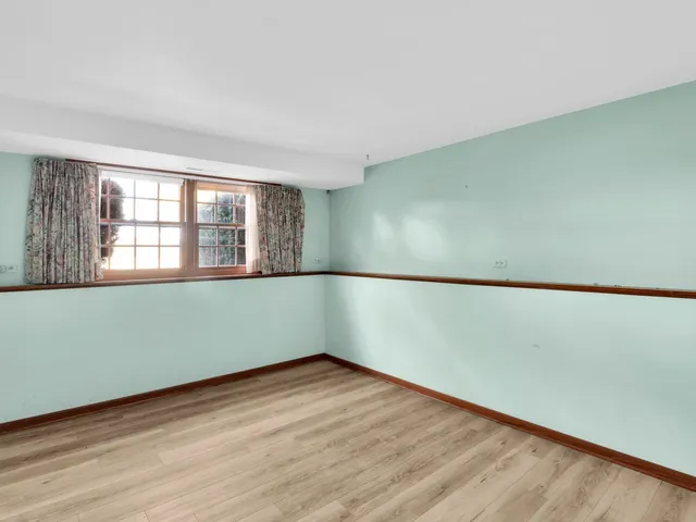 a bathroom with a shower and a sink