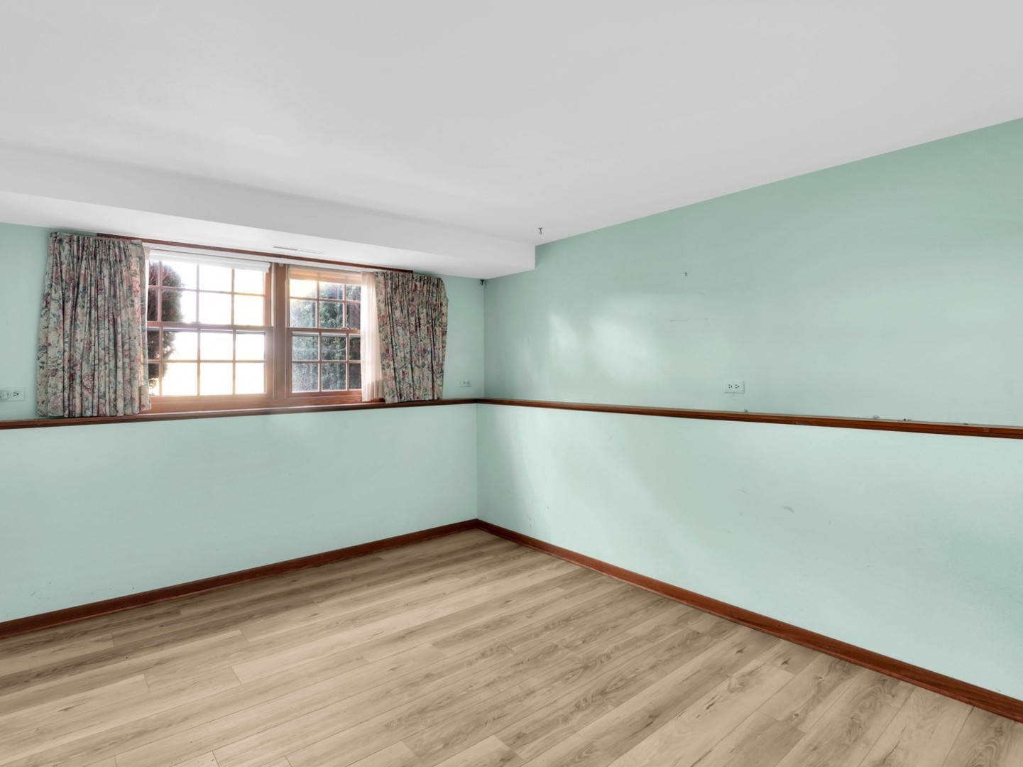 3303 Vermont Road Woodstock, IL 60098 - Photo 21 of 68 an empty room with wooden floor and windows