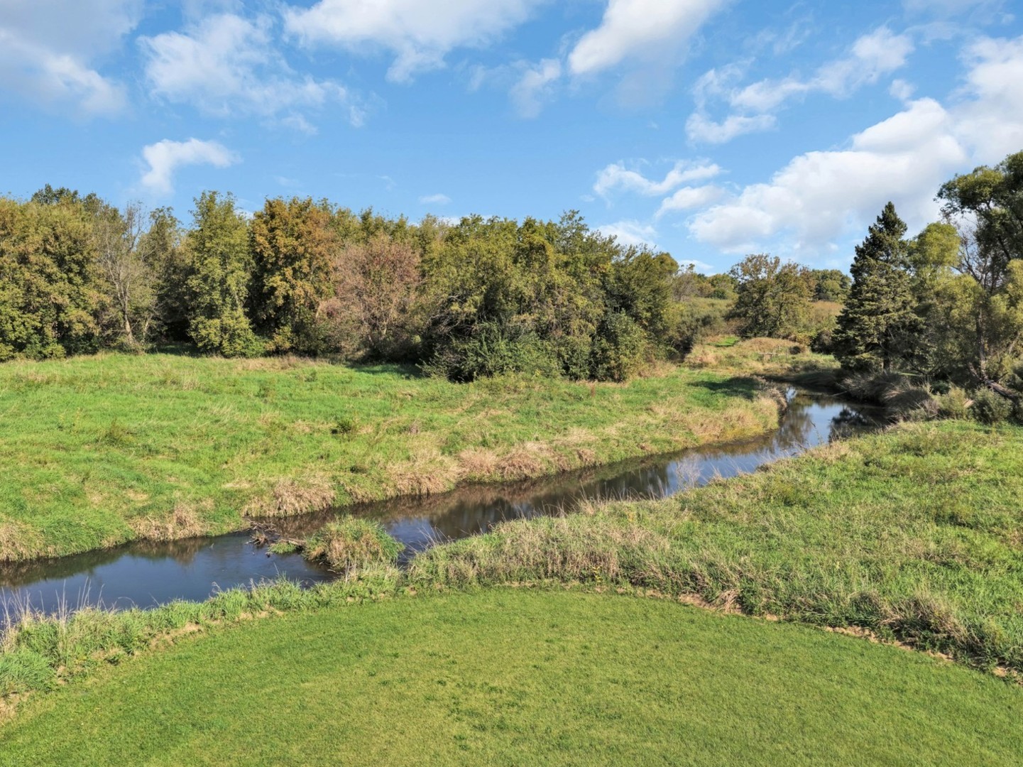 3303 Vermont Road Woodstock, IL 60098 - Photo 43 of 68 a view of a lake with houses