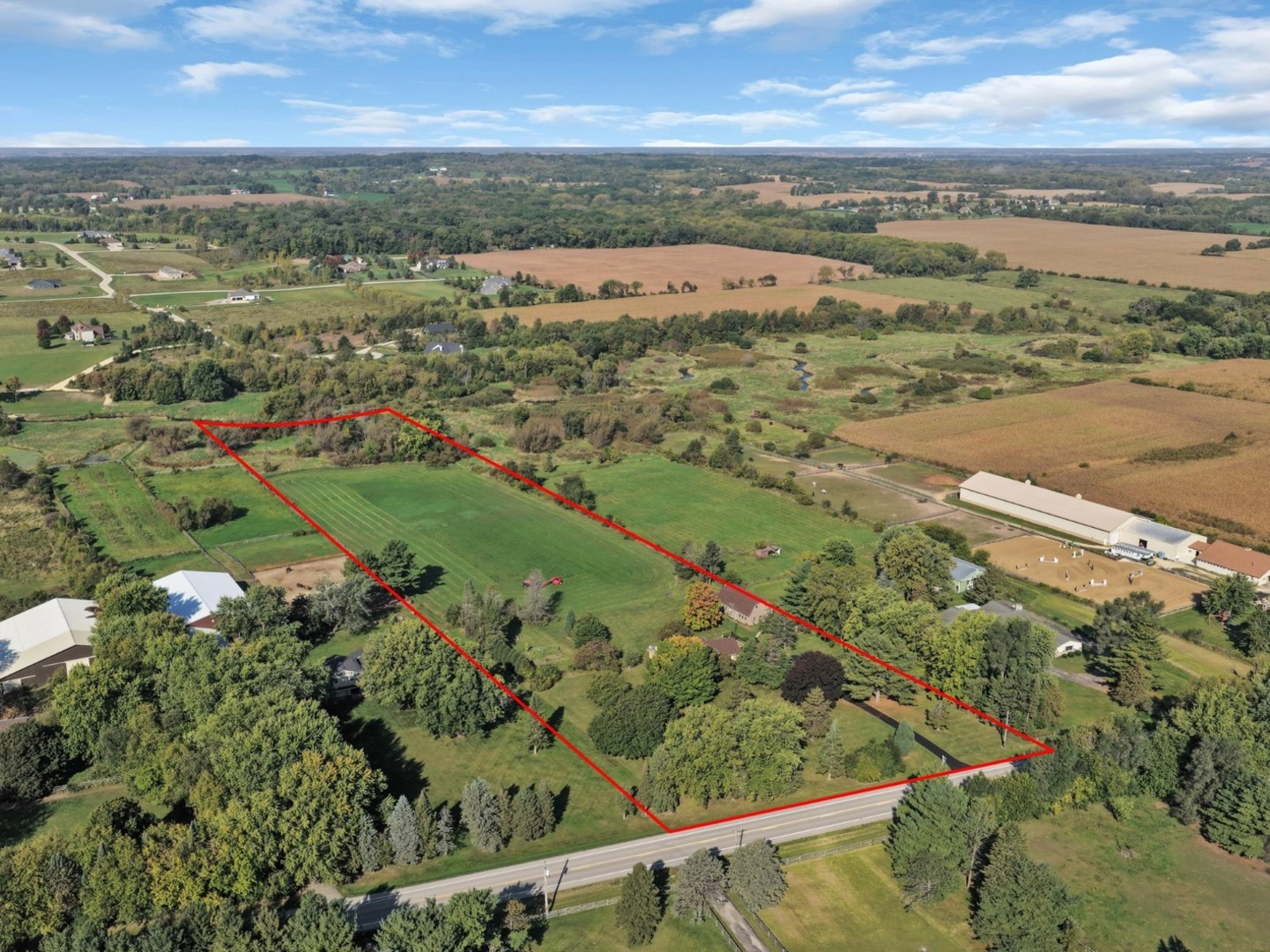 3303 Vermont Road Woodstock, IL 60098 - Photo 48 of 68 an aerial view of a houses with outdoor space