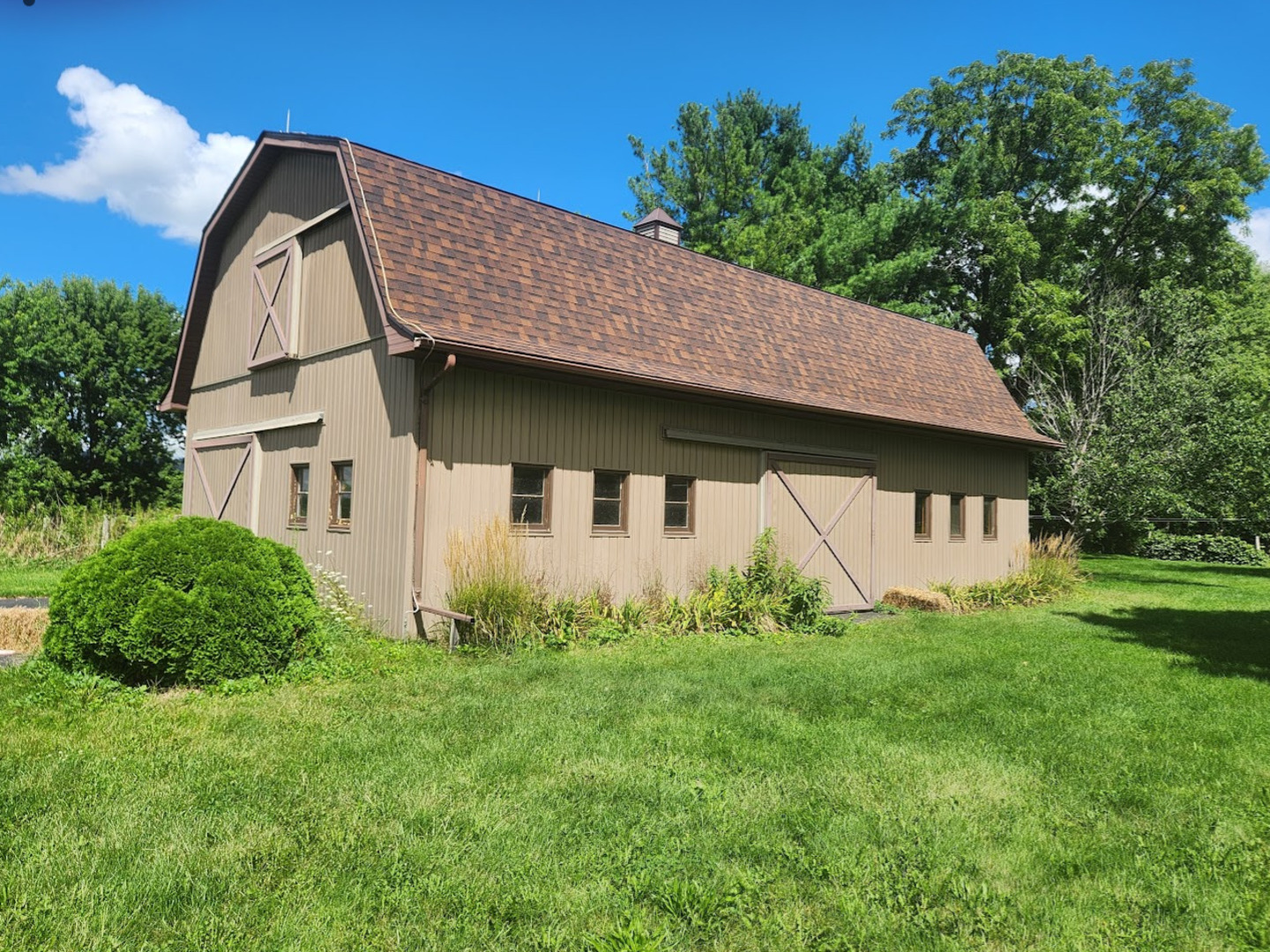 3303 Vermont Road Woodstock, IL 60098 - Photo 64 of 68 a aerial view of a house next to a big yard and large trees
