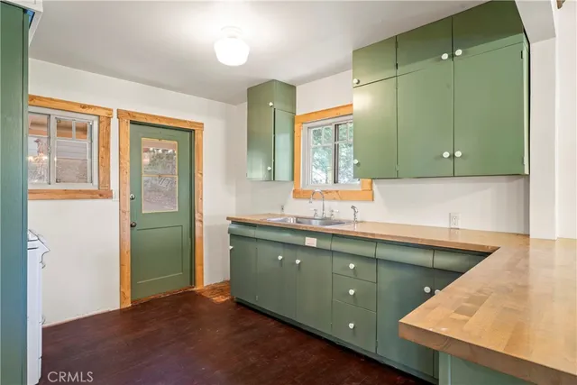a bathroom with a sink and a large mirror