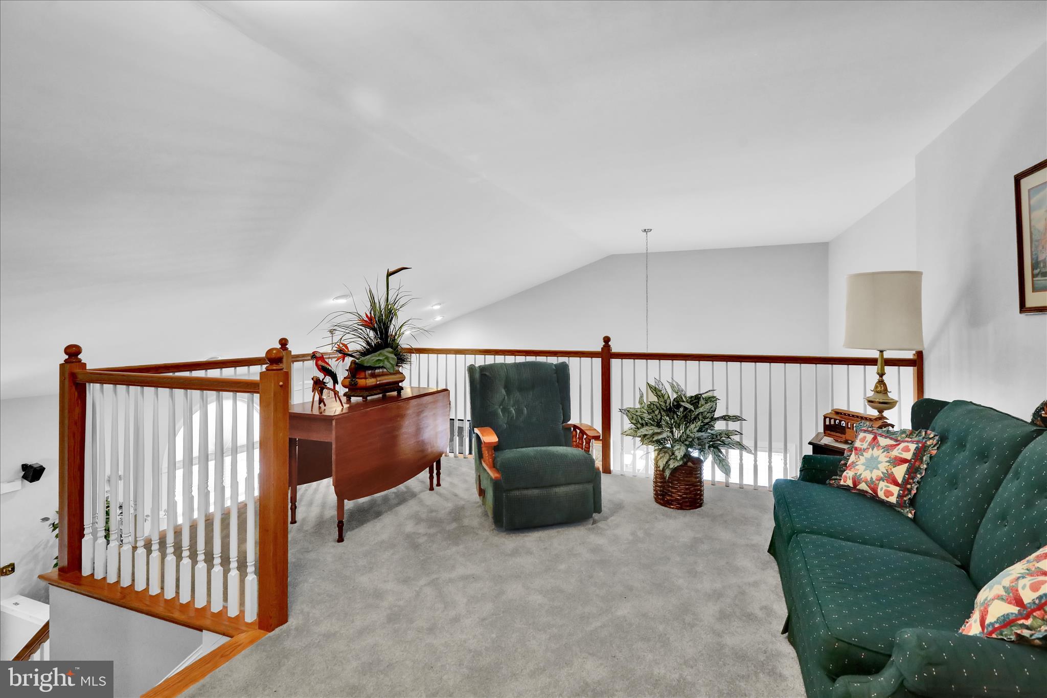 110 South Cacoosing Drive Reading, PA 19608 - Photo 23 of 32 a living room with furniture and flowers