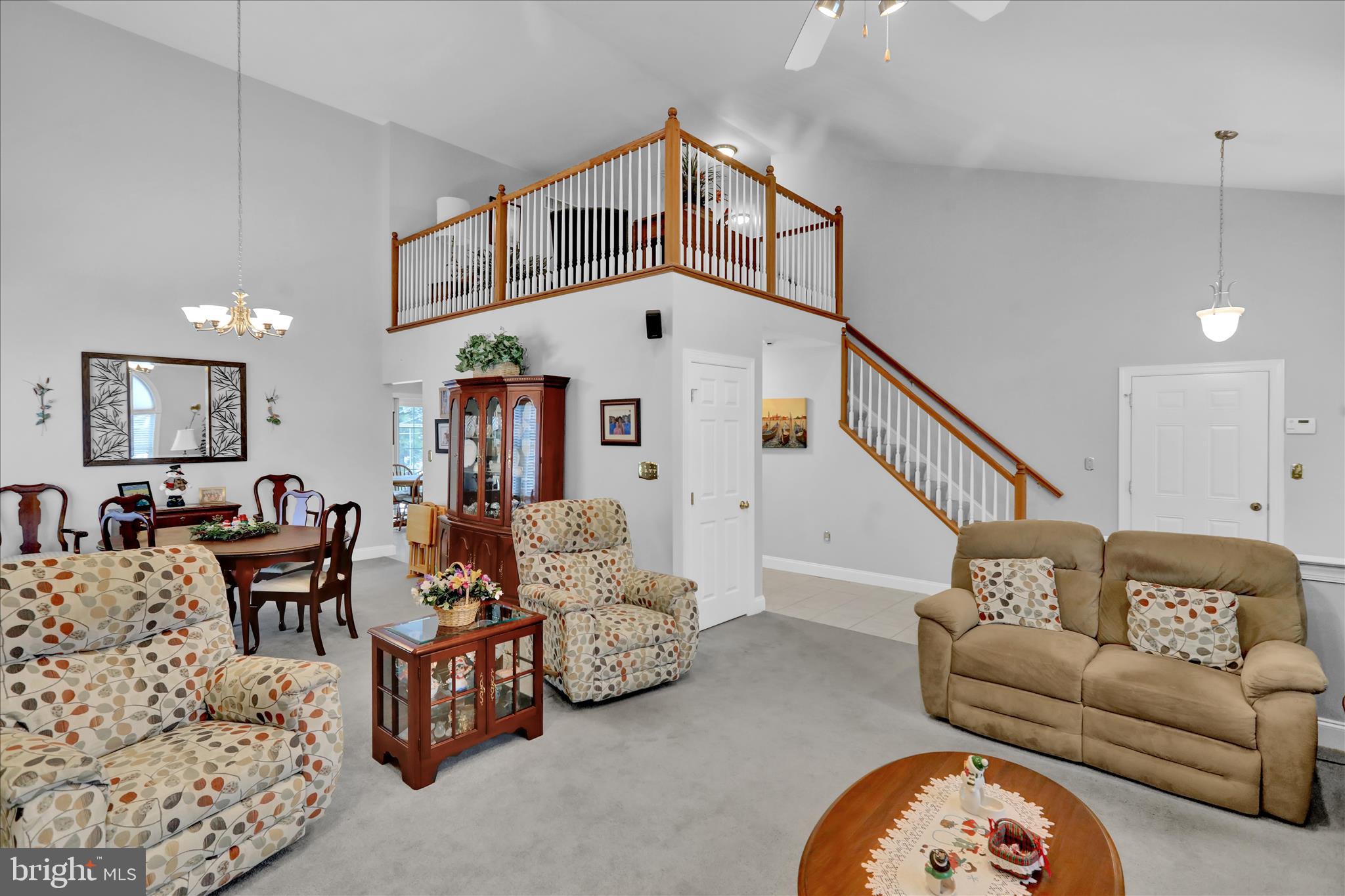 110 South Cacoosing Drive Reading, PA 19608 - Photo 6 of 32 a living room with furniture and a chandelier