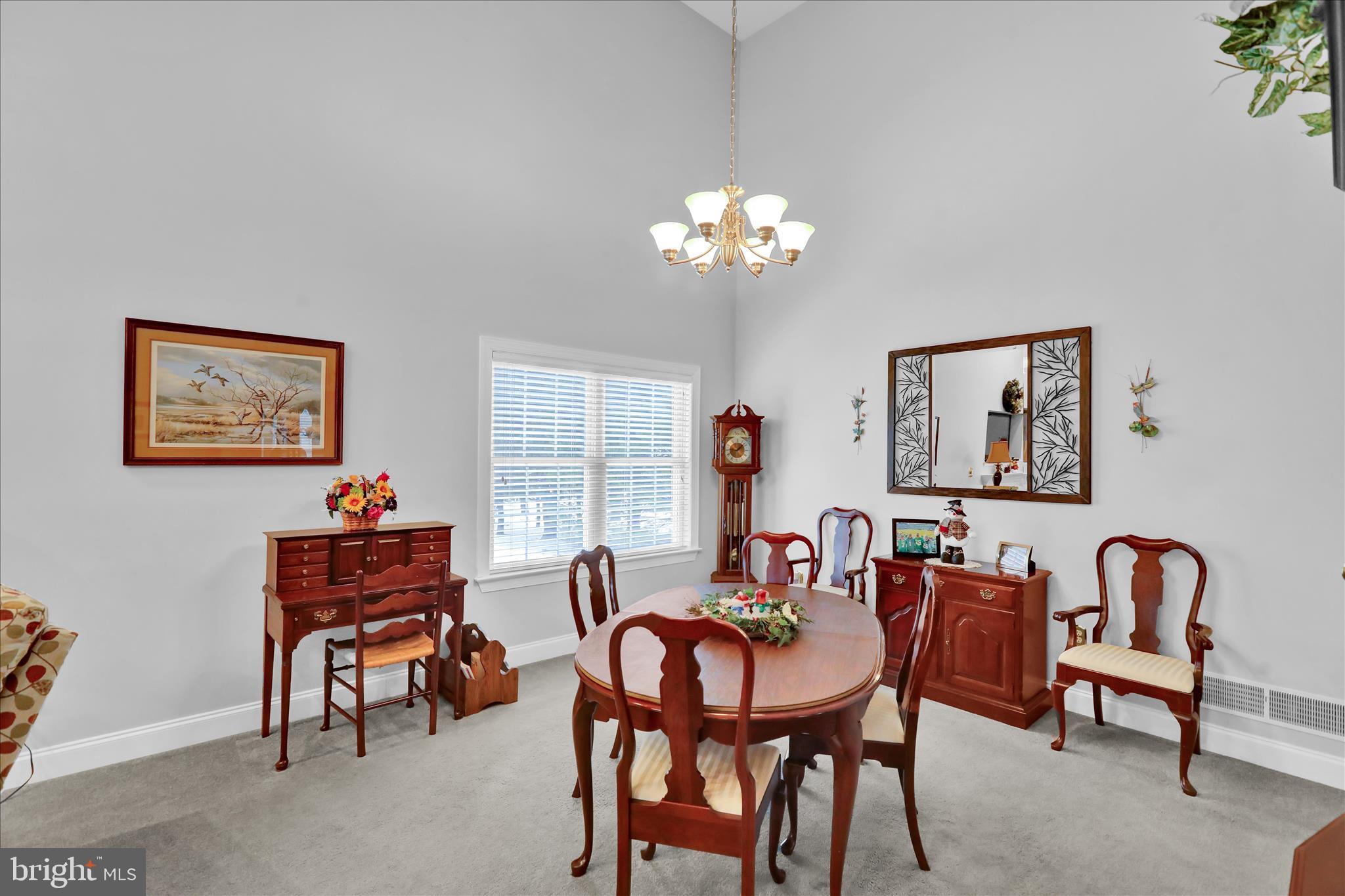 110 South Cacoosing Drive Reading, PA 19608 - Photo 8 of 32 a view of a dining room with furniture a chandelier and a window