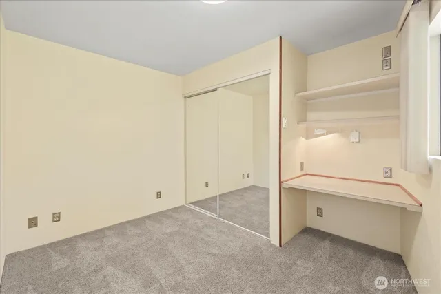 a view of a kitchen with furniture and a kitchen