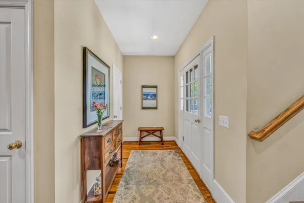 a view of a hallway with windows