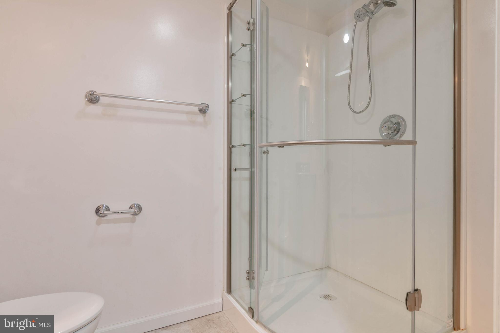 14217 Piccadilly Road Silver Spring, MD 20906 - Photo 24 of 38 a bathroom with a shower