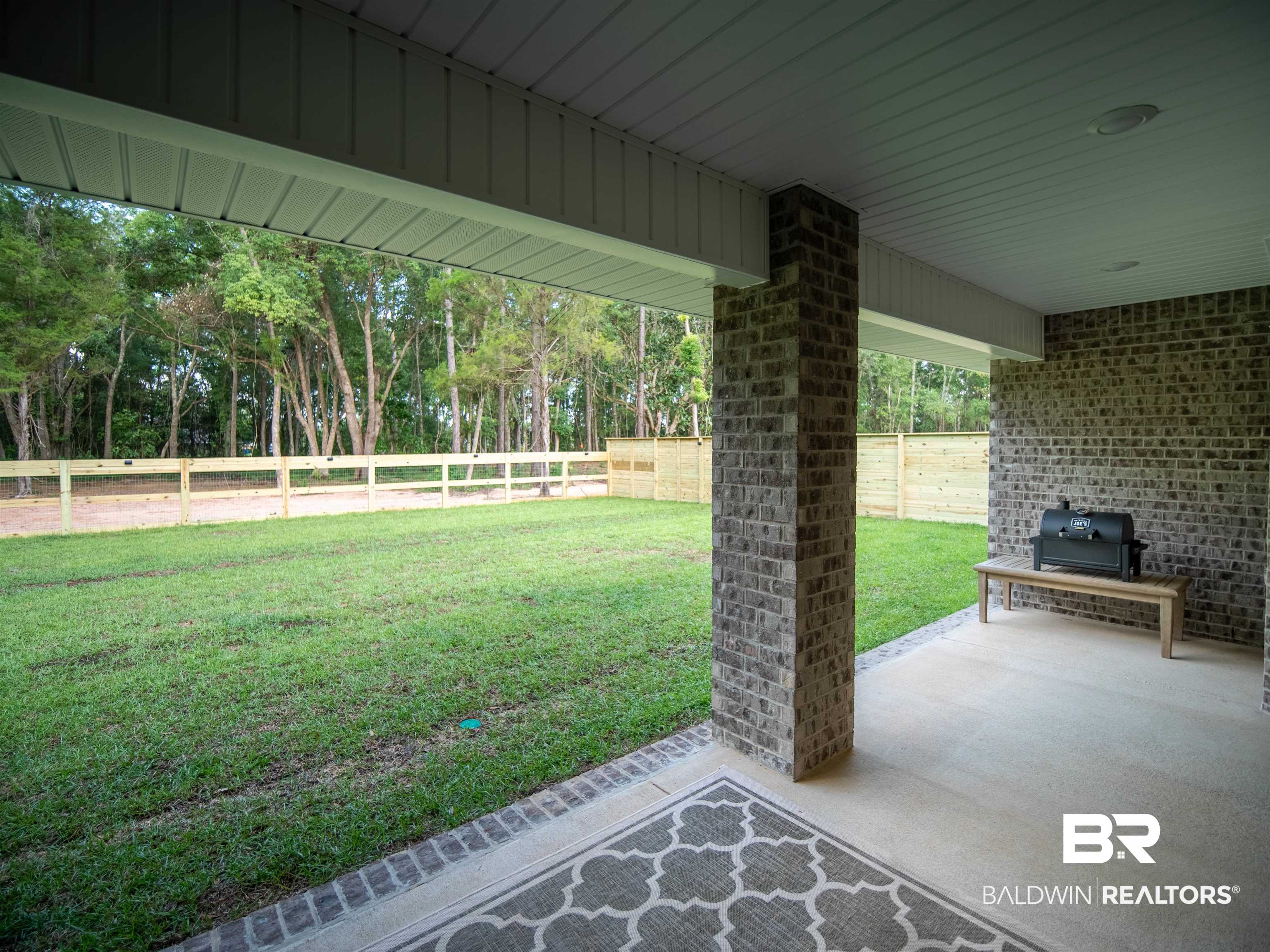 12646 Michigan Avenue Elberta, AL 36530 - Photo 37 of 47 Fenced backyard featuring a patio area