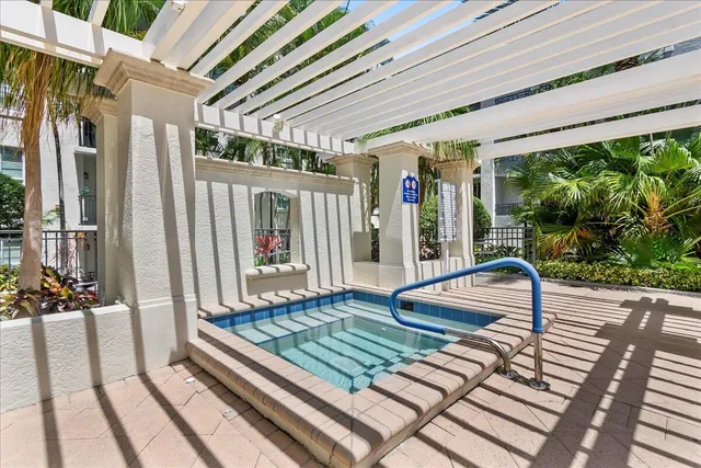 a white tub sitting in a bathroom