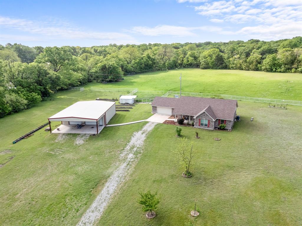 254 Jackson Road Whitewright, TX 75491 - Photo 3 of 40 Aerial front view of home and workshop