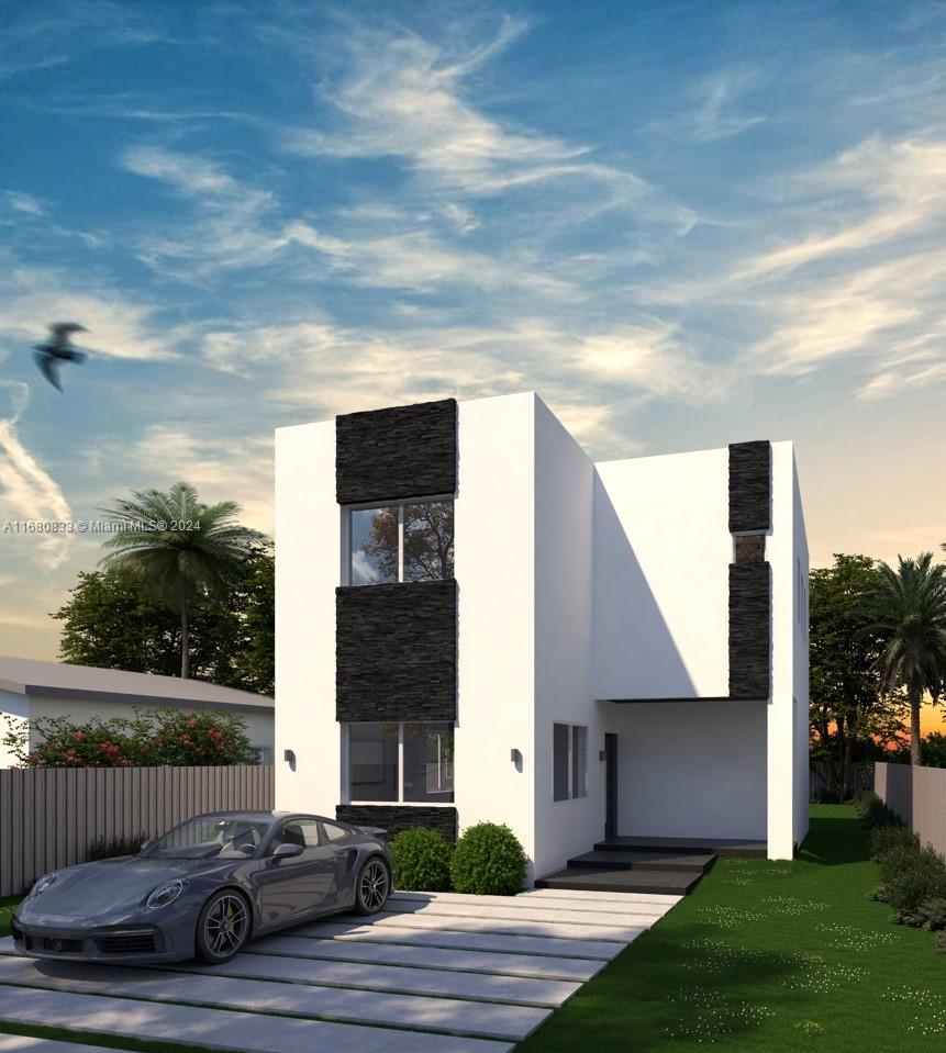 721 Northwest 5th Avenue Pompano Beach, FL 33060 - Photo 10 of 10 a view of backyard with barbeque grill and wooden fence